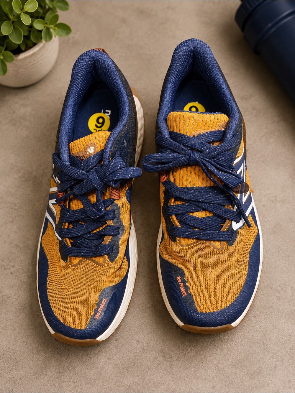 New Balance women Navy and Mustard Athletic Sneakers